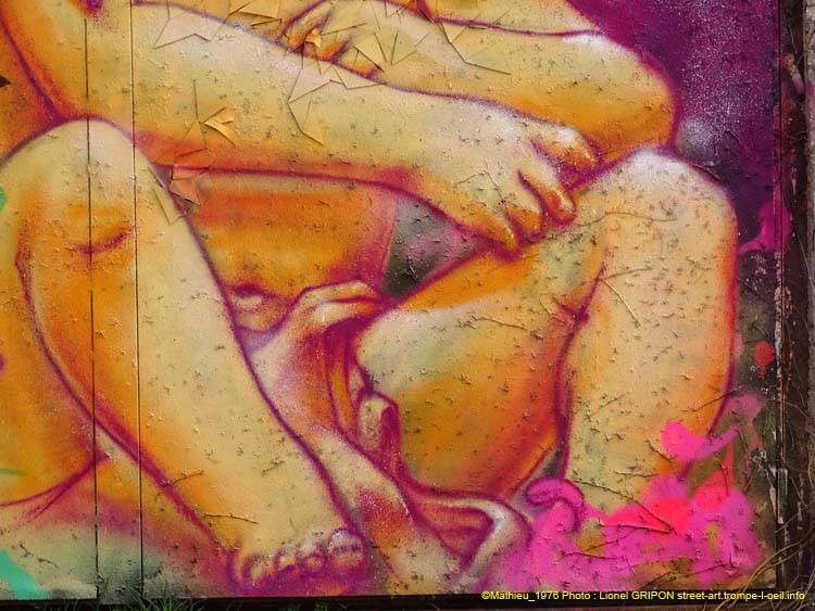 Ange assis